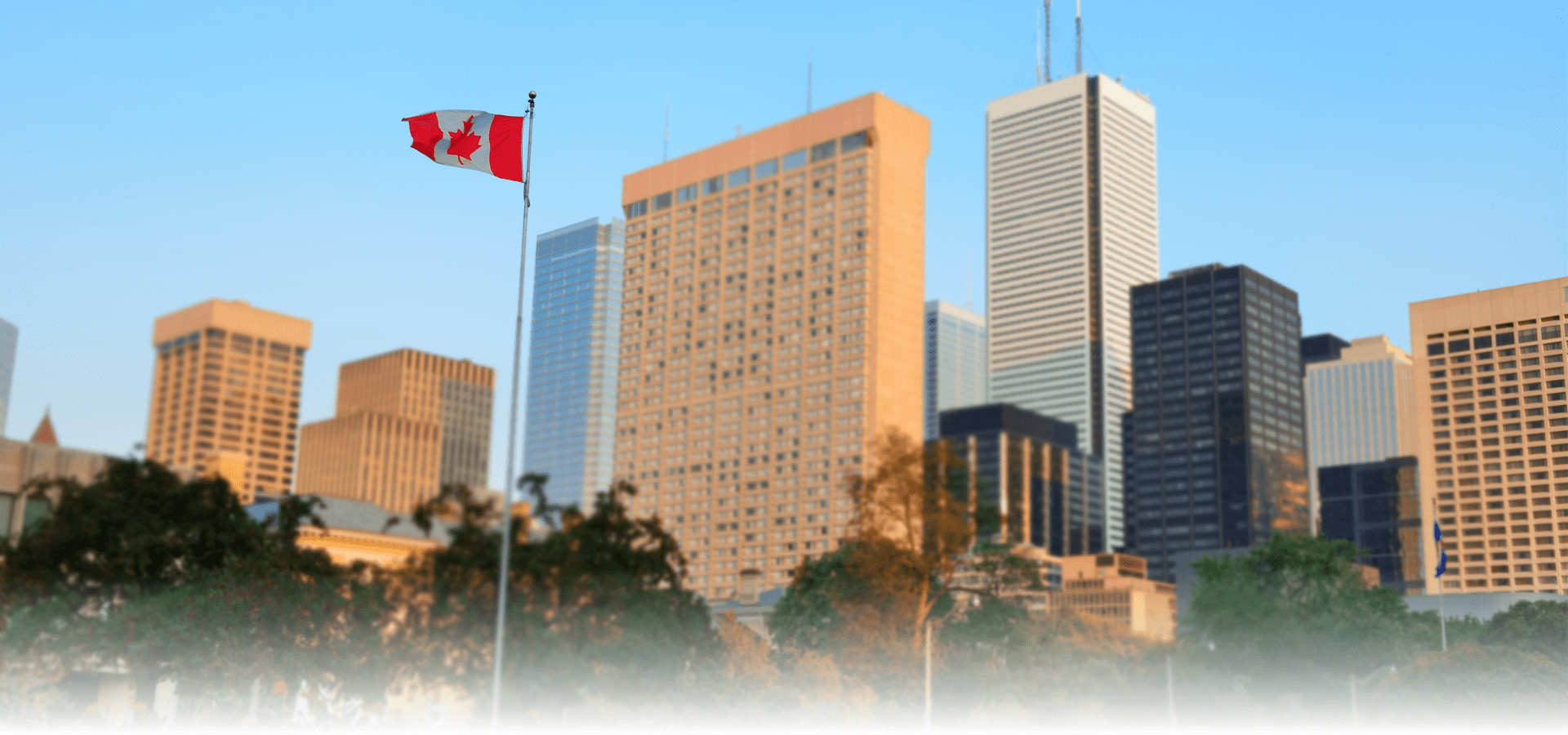 City skyline with Canadian flag